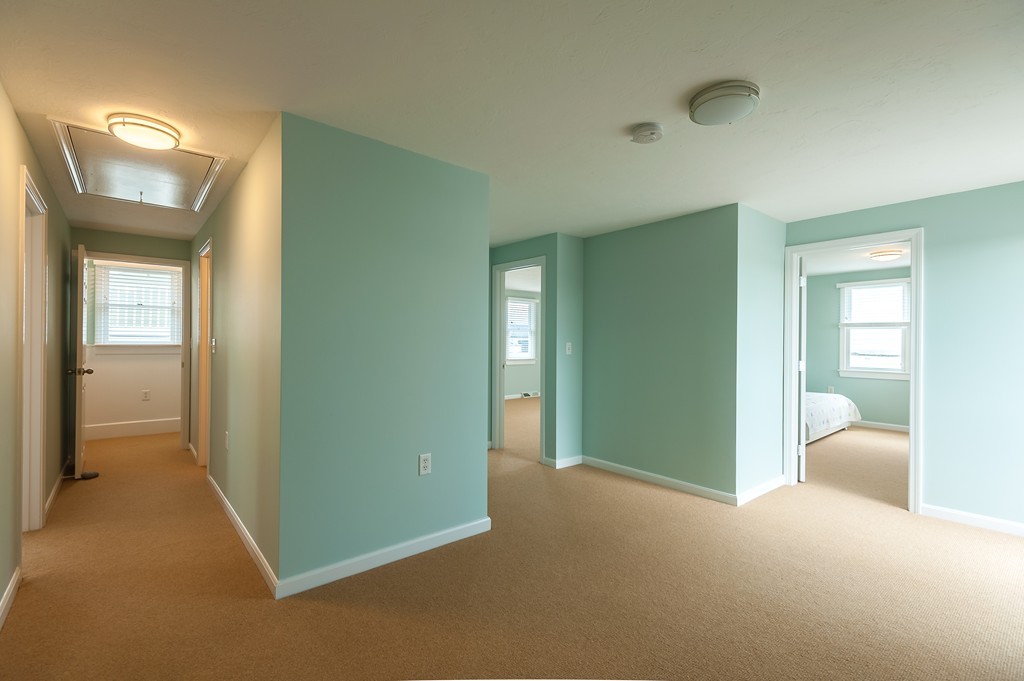 149 Jericho Road, Unit B Scituate, MA 02066 - Photo 17 of 22 a view of a room that has a bed