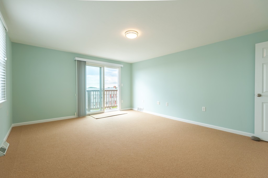 149 Jericho Road, Unit B Scituate, MA 02066 - Photo 19 of 22 a view of an empty room with a window