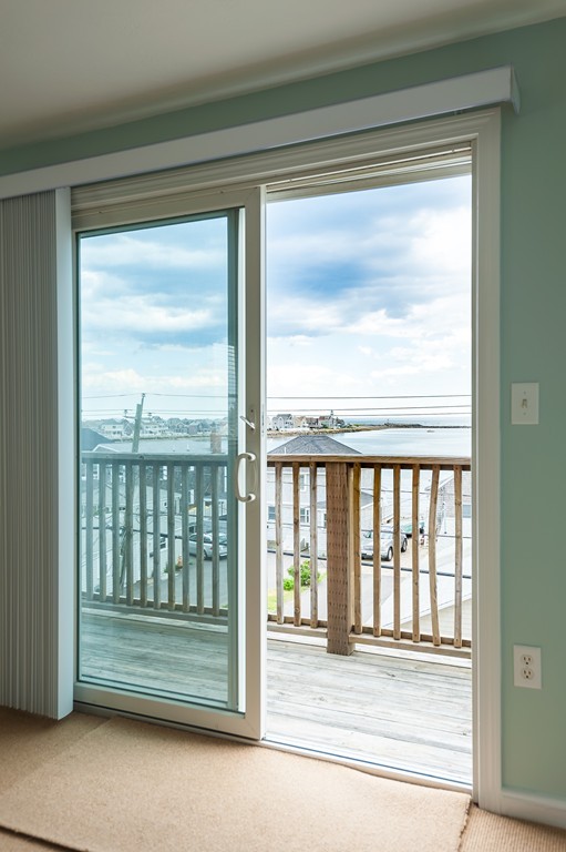 149 Jericho Road, Unit B Scituate, MA 02066 - Photo 20 of 22 a view of empty room with balcony