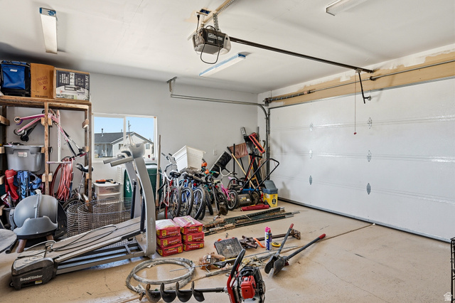 1637 East Midvalley Road Enoch, UT 84721 - Photo 35 of 48 Garage with a garage door opener