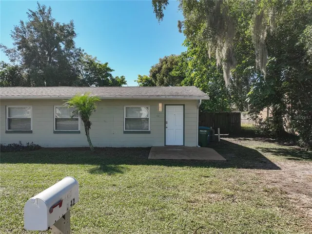 a house view with a garden space