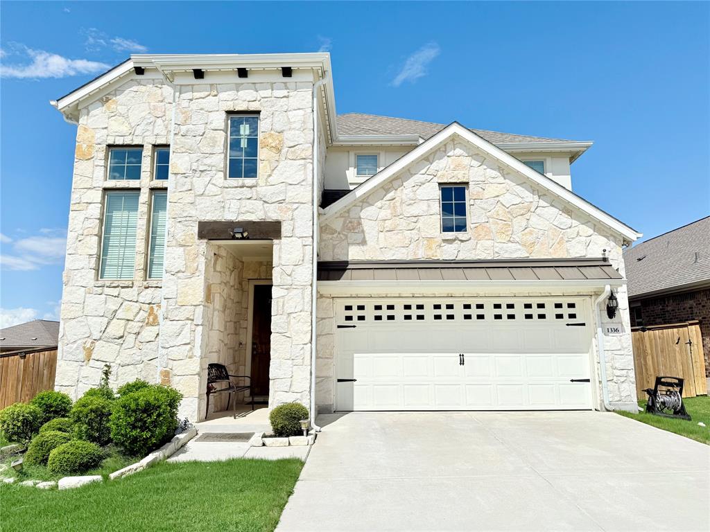 1336 Morning View Road Georgetown, TX 78628 - Photo 1 of 40 Crafted from natural stone, this stately home features an attached garage and neatly manicured front yard.