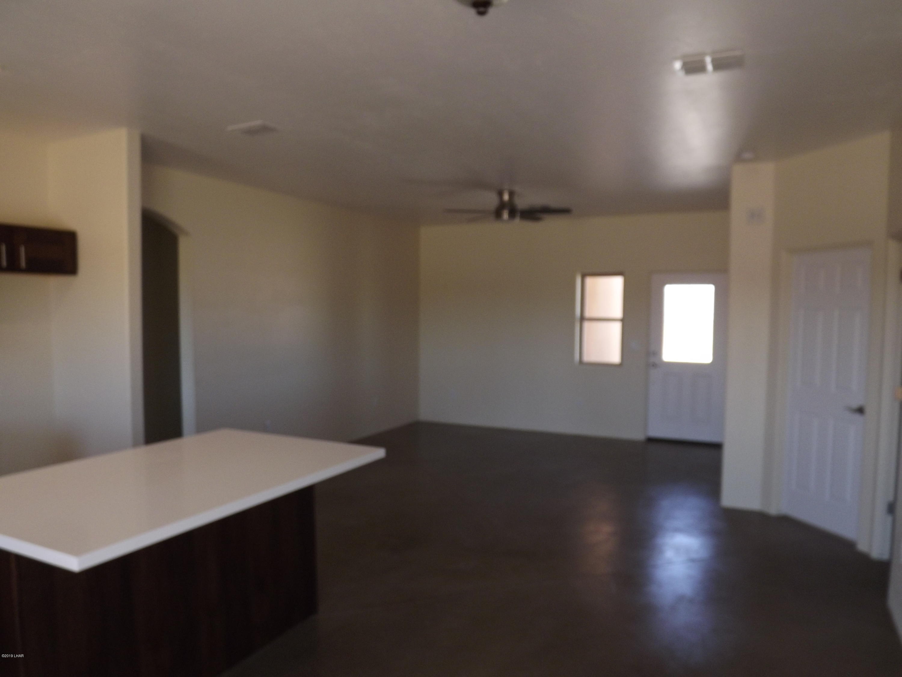 2516 Cielo Road Yucca, AZ 86438 - Photo 15 of 34 Stained concrete floors