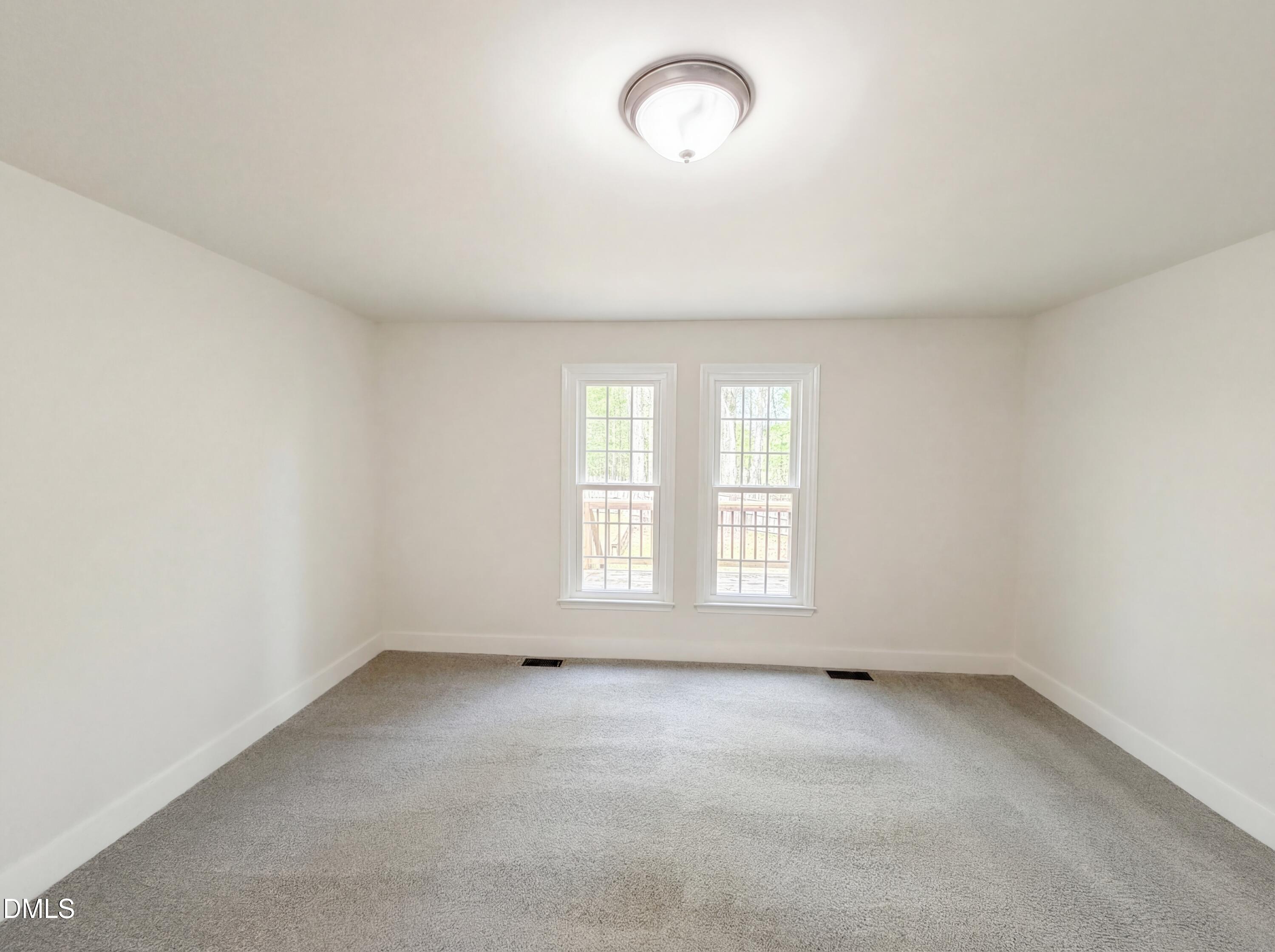 515 Gablefield Lane Apex, NC 27502 - Photo 11 of 20 an empty room with a window