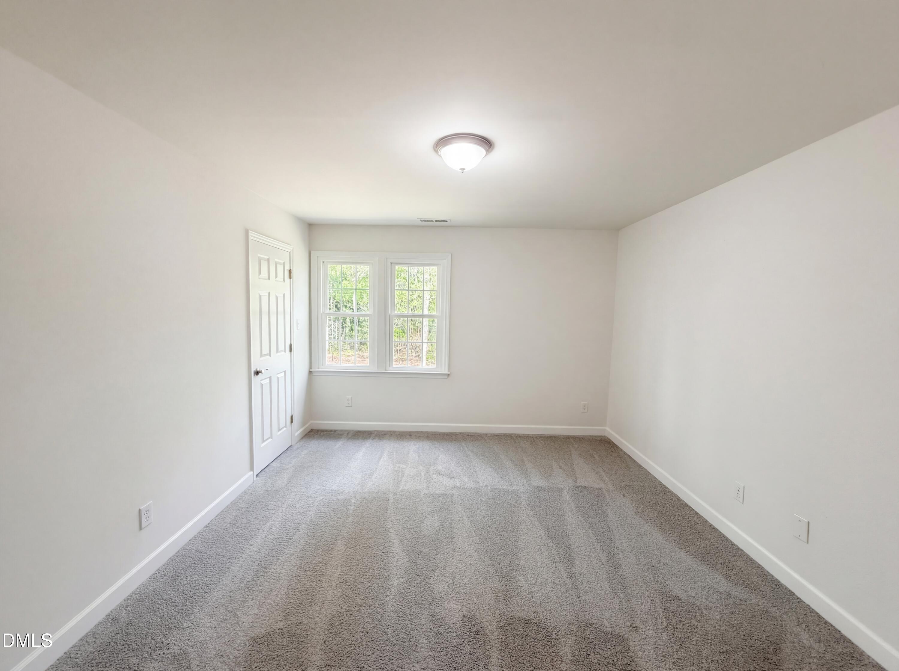 515 Gablefield Lane Apex, NC 27502 - Photo 13 of 20 an empty room with a window