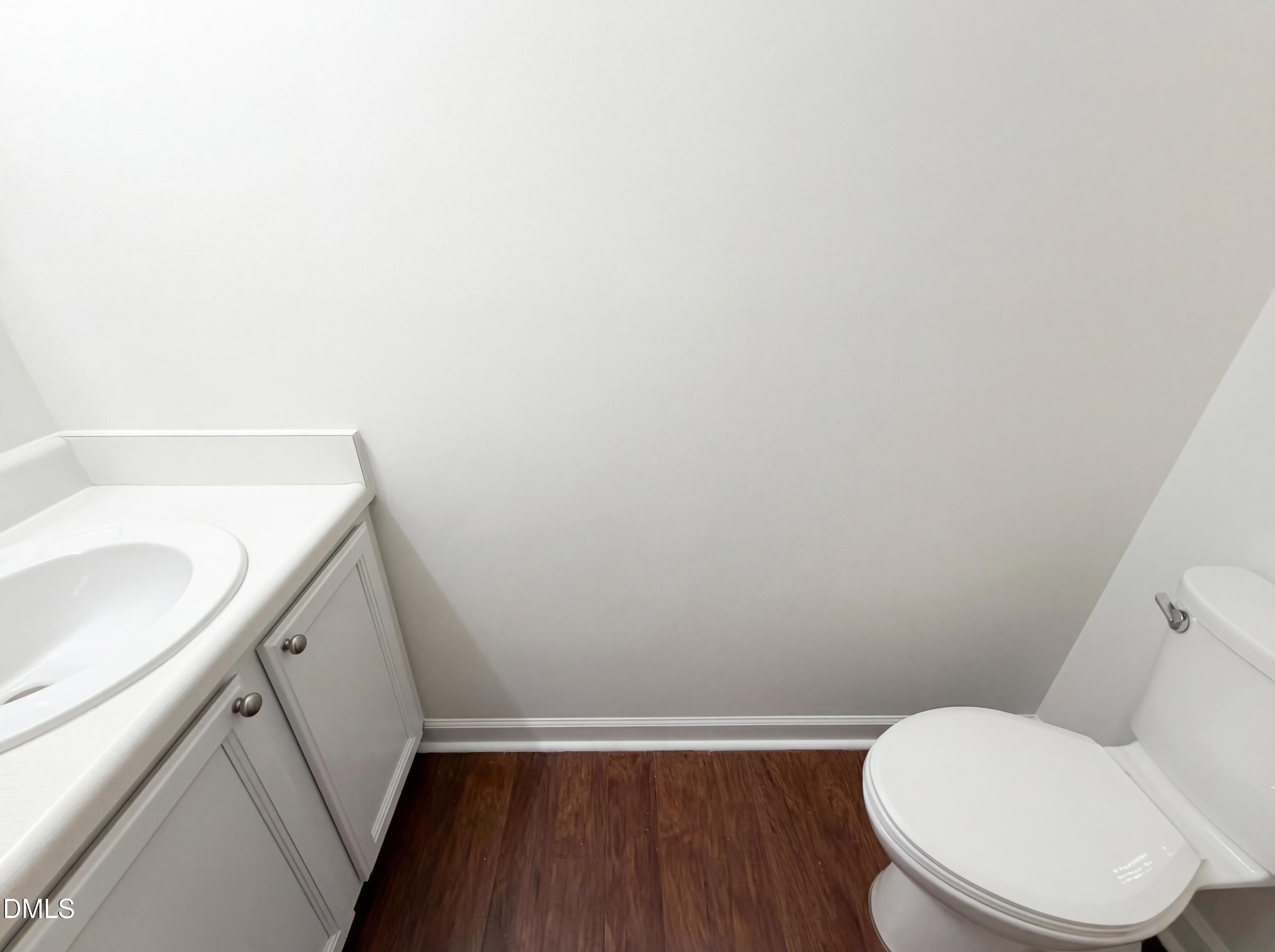 515 Gablefield Lane Apex, NC 27502 - Photo 18 of 20 a bathroom with a sink and toilet