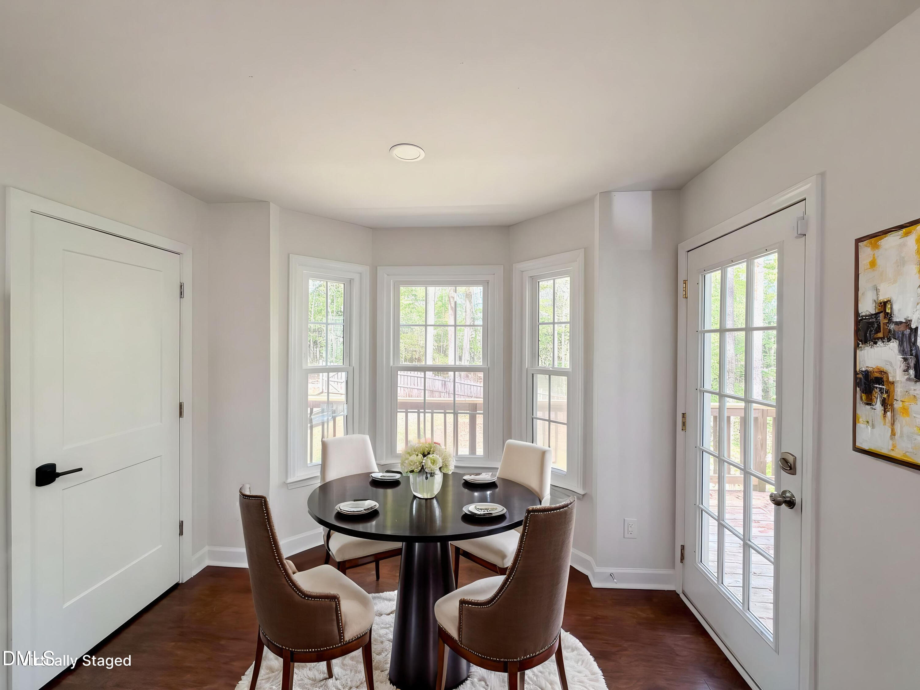 515 Gablefield Lane Apex, NC 27502 - Photo 5 of 20 a view of a dining room with furniture and windows