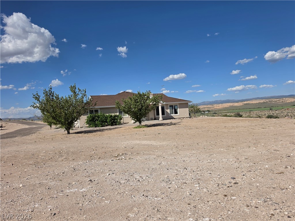 5272 Truman Lane Caliente, NV 89008 - Photo 37 of 43 A desert oasis with panoramic views, this home offers tranquility and wide-open spaces.