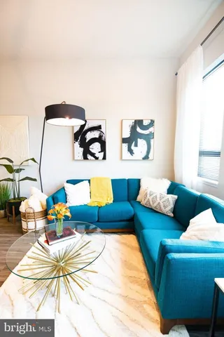 a living room with furniture and rug