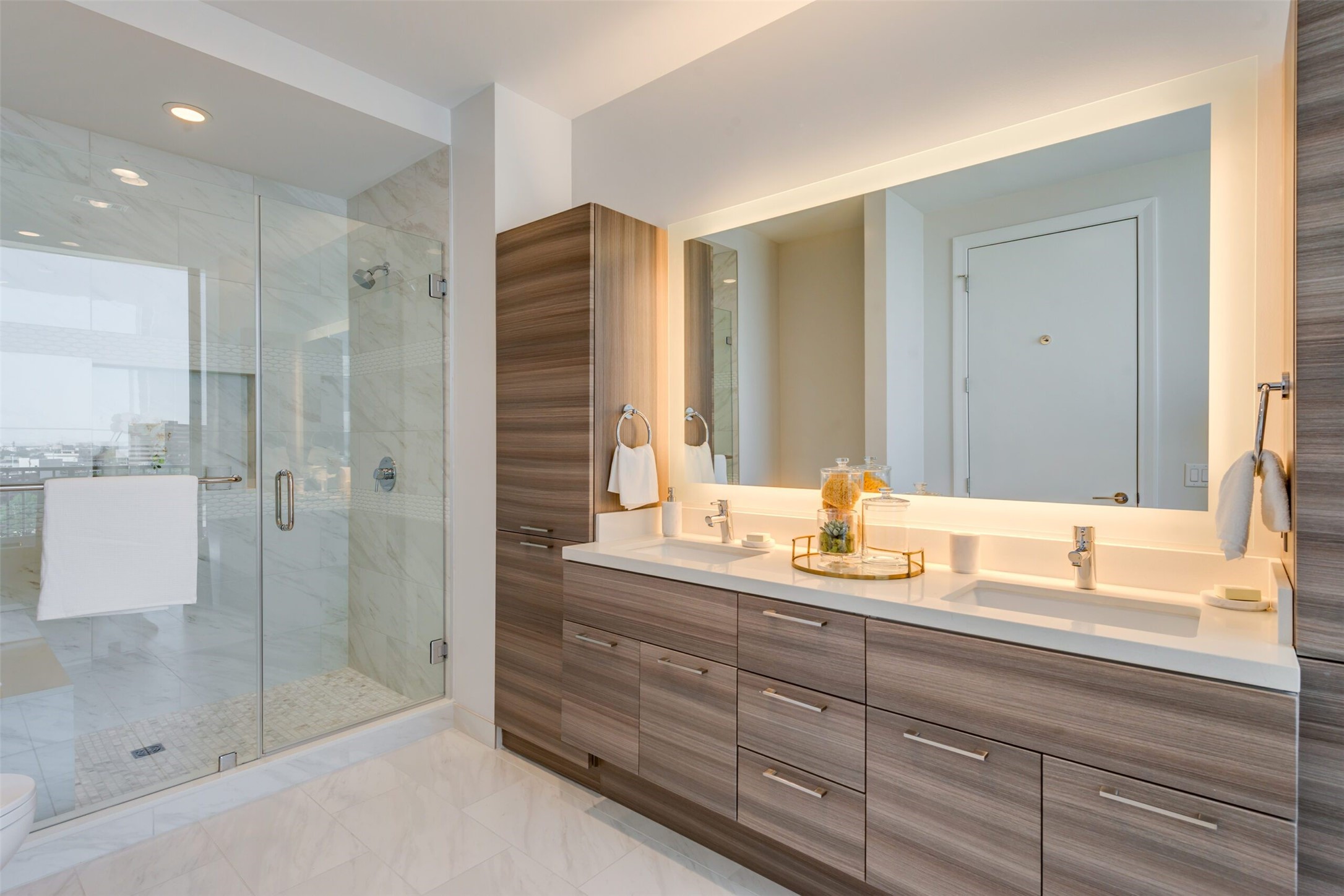 3333 Lake Street, Unit TH5 Houston, TX 77098 - Photo 13 of 50 a bathroom with a shower sink and mirror