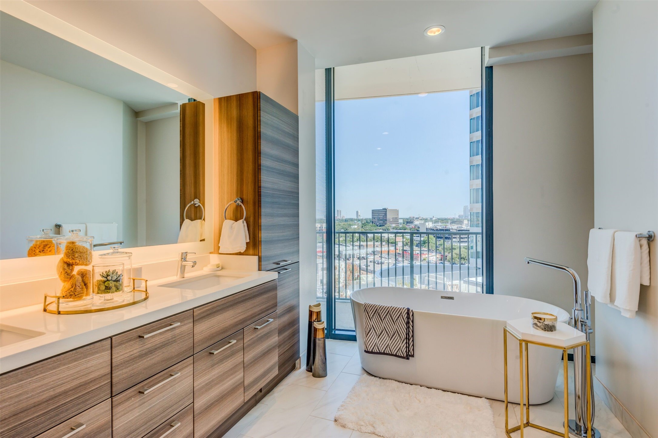3333 Lake Street, Unit TH5 Houston, TX 77098 - Photo 14 of 50 a spacious bathroom with a double vanity sink and a mirror