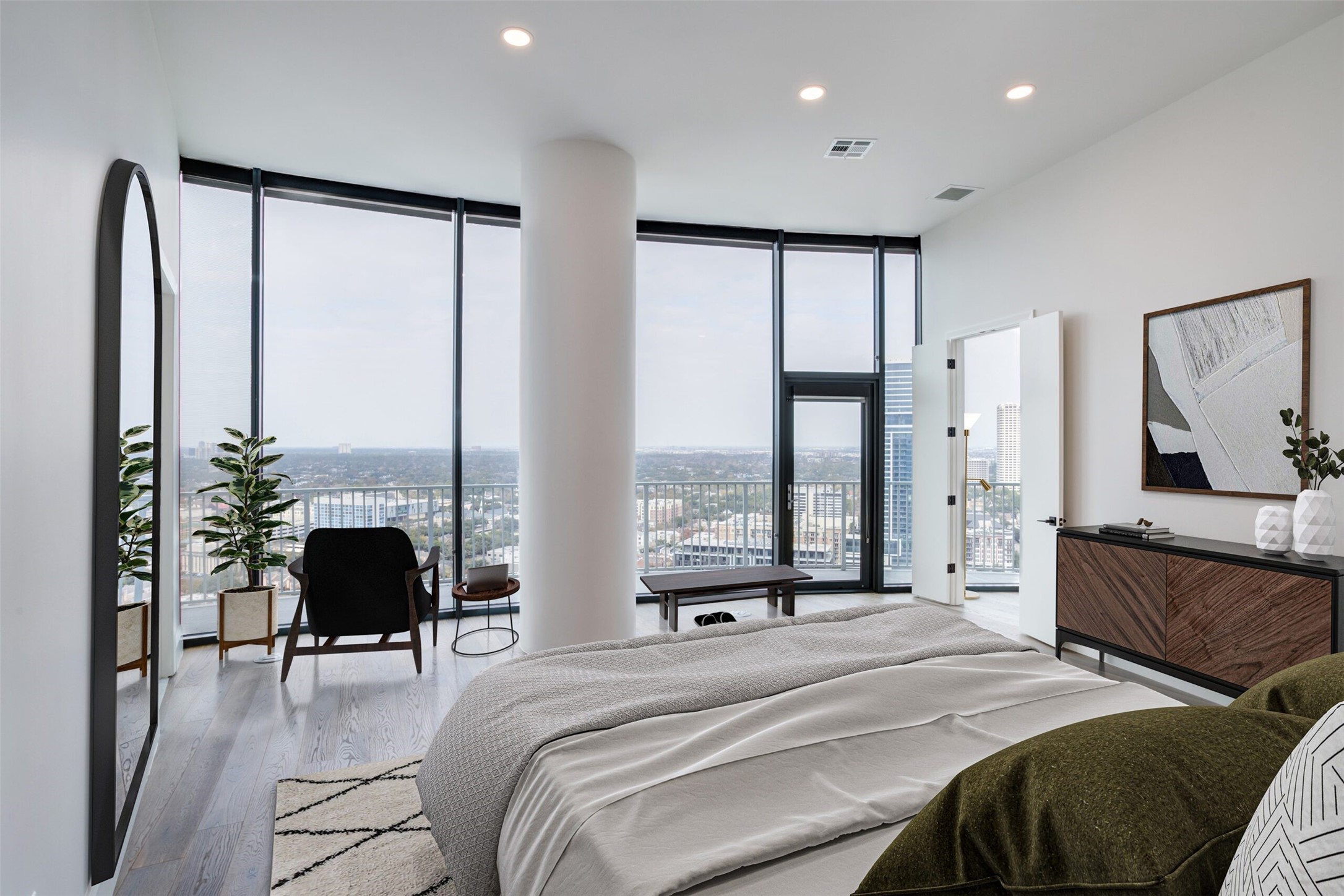 3333 Lake Street, Unit TH5 Houston, TX 77098 - Photo 27 of 50 a bedroom with a bed window and a large mirror