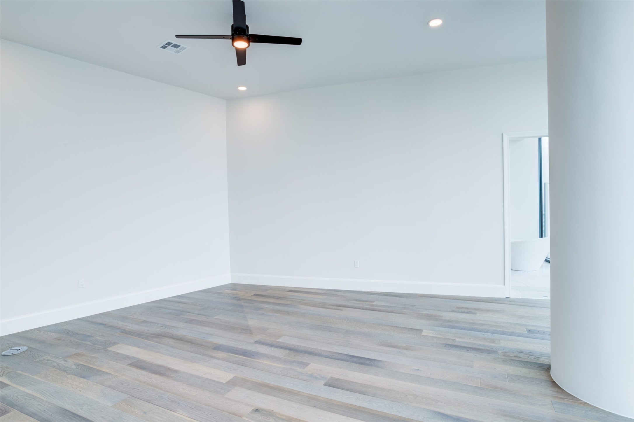 3333 Lake Street, Unit TH5 Houston, TX 77098 - Photo 39 of 50 a view of a room with wooden floor