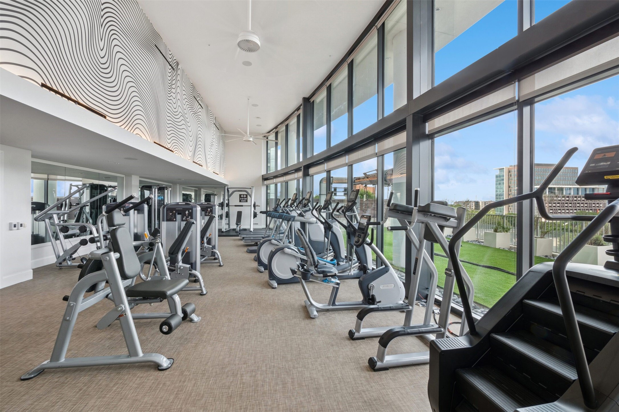 3333 Lake Street, Unit TH5 Houston, TX 77098 - Photo 46 of 50 a view of a room with gym equipment