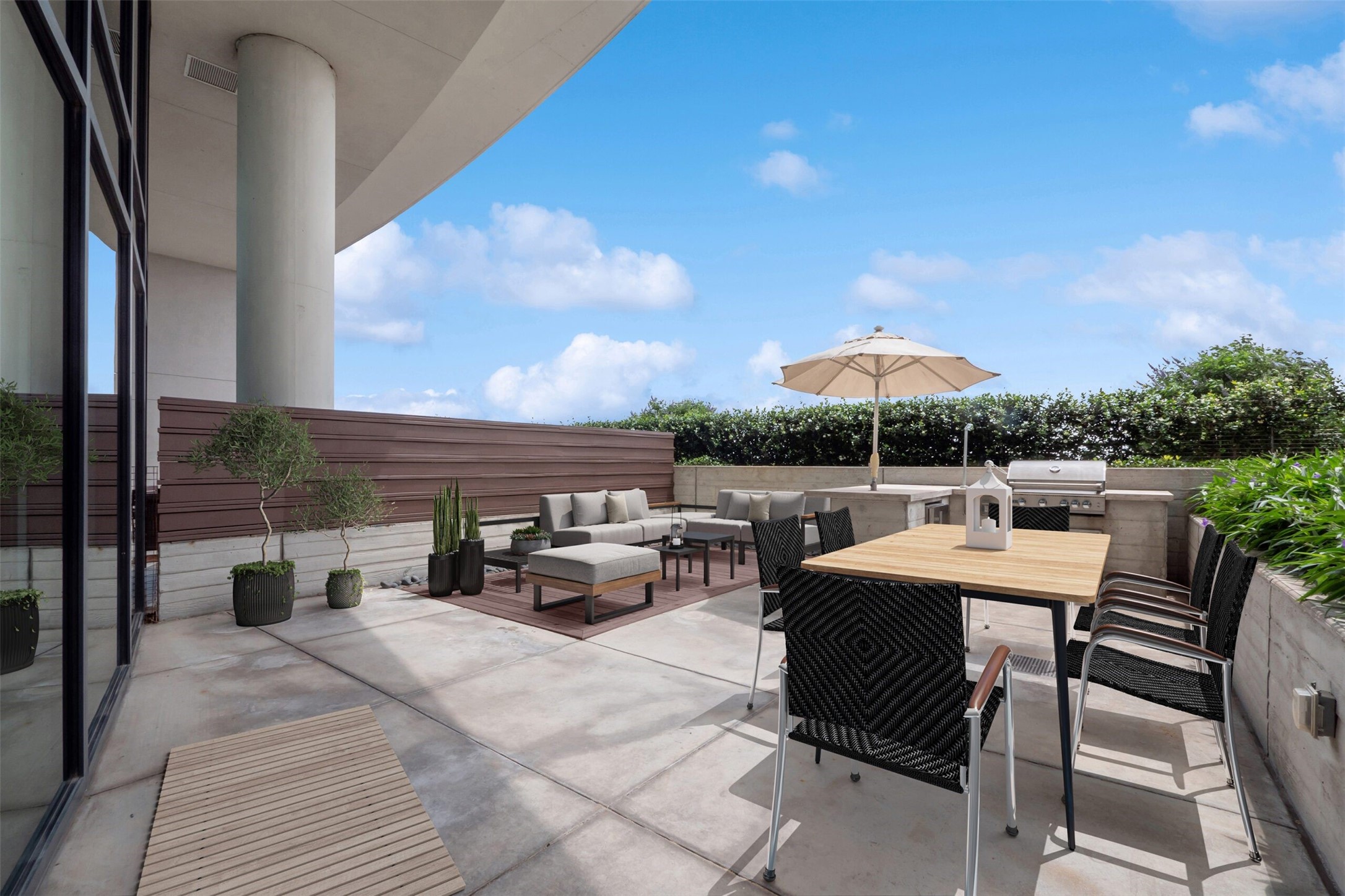 3333 Lake Street, Unit TH5 Houston, TX 77098 - Photo 10 of 50 a terrace with outdoor seating and city view