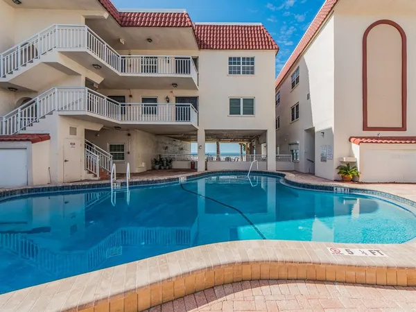 a view of a house with a swimming pool