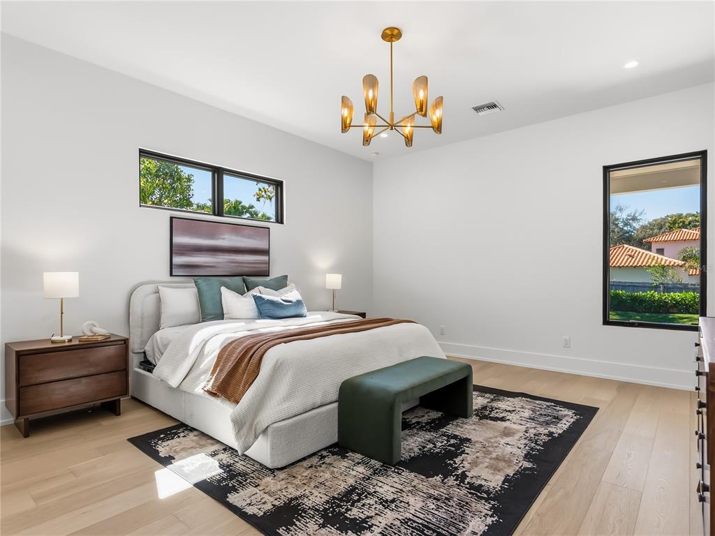 1821 Englewood Road Winter Park, FL 32789 - Photo 14 of 36 a bedroom with a bed and a window