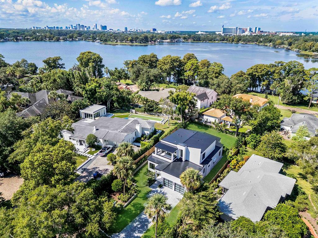 1821 Englewood Road Winter Park, FL 32789 - Photo 35 of 36 an aerial view of lake and residential houses with outdoor space