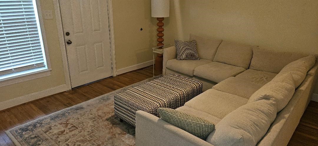 932 Walling Street Houston, TX 77009 - Photo 23 of 23 a living room with furniture and a rug