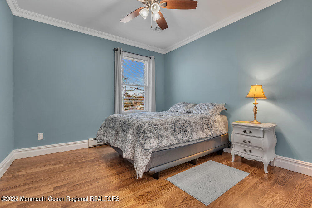 612 Lake Avenue Spring Lake Heights, NJ 07762 - Photo 15 of 22 a bedroom with a bed and window