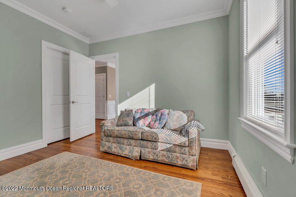 612 Lake Avenue Spring Lake Heights, NJ 07762 - Photo 16 of 22 a living room with furniture and a rug