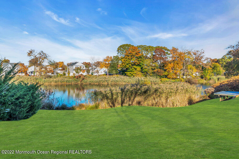 612 Lake Avenue Spring Lake Heights, NJ 07762 - Photo 19 of 22 a view of a lake with houses in the back