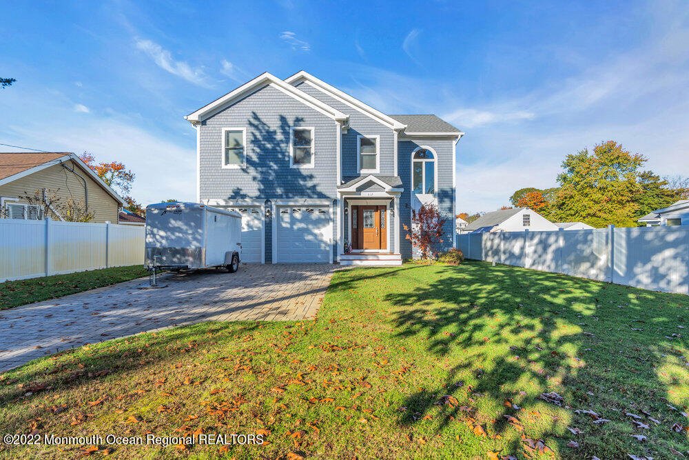 612 Lake Avenue Spring Lake Heights, NJ 07762 - Photo 22 of 22 a front view of a house with a yard