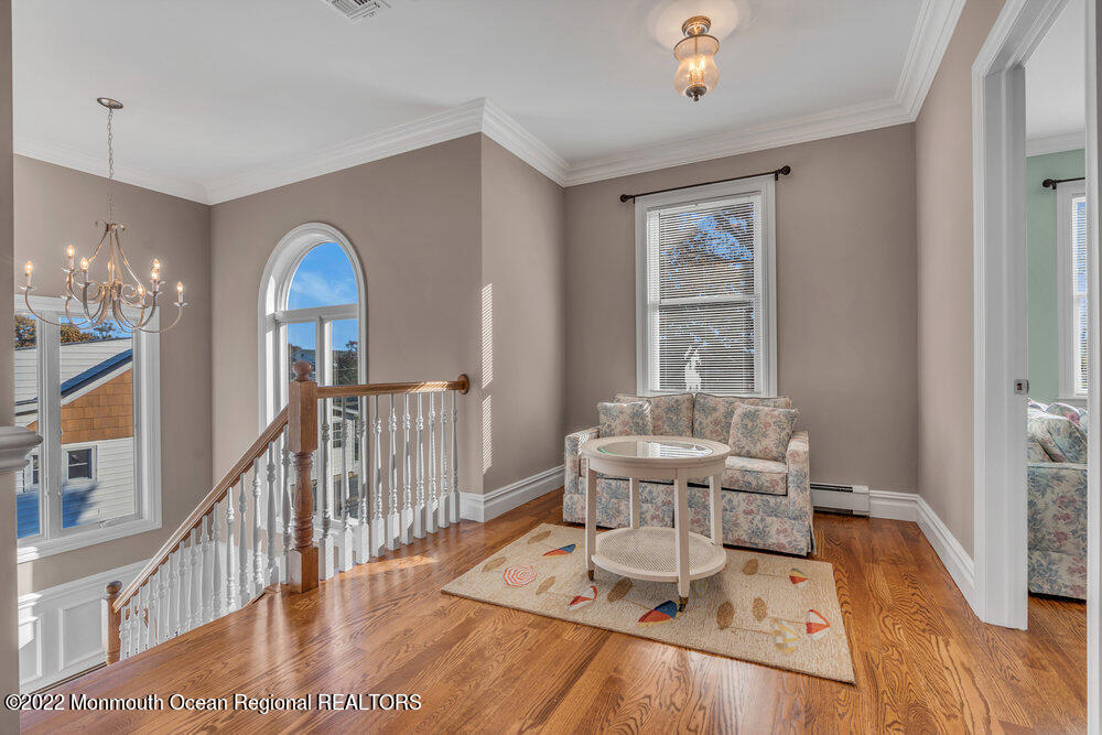612 Lake Avenue Spring Lake Heights, NJ 07762 - Photo 9 of 22 a living room with furniture and wooden floor