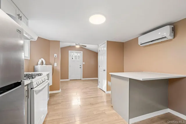 a view of a kitchen with a sink
