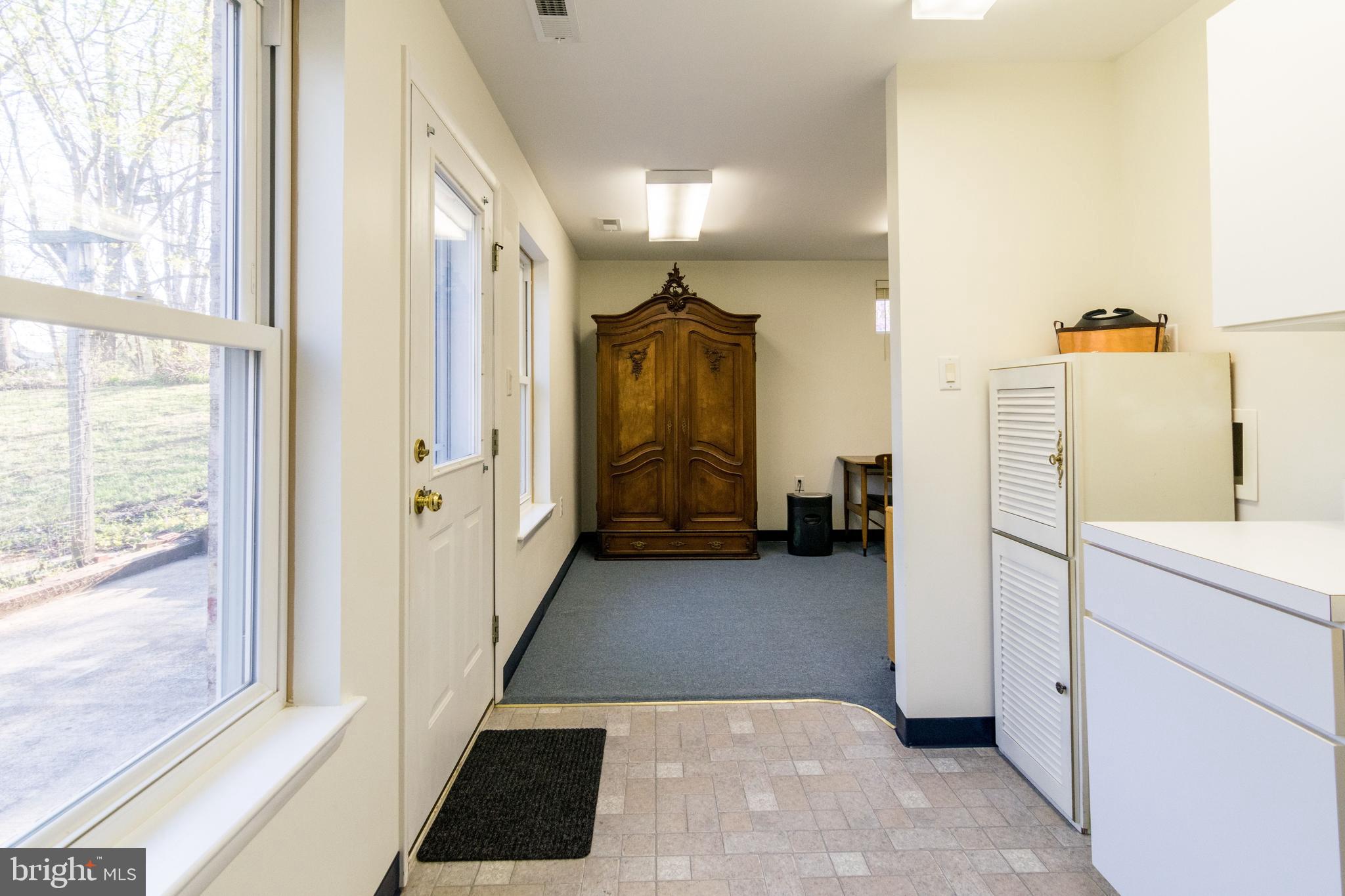 770 John Rissler Road Charles Town, WV 25414 - Photo 29 of 32 Rear Entry Mudroom/Utility Area with Wash Sink