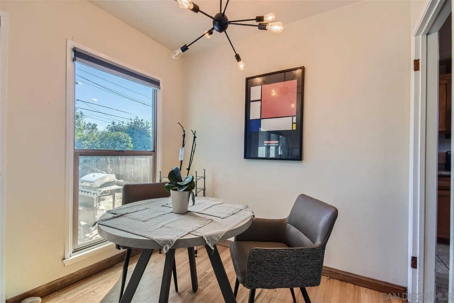 5259 Laurel Street San Diego, CA 92105 - Photo 11 of 32 a view of a dining room with furniture window and outside view