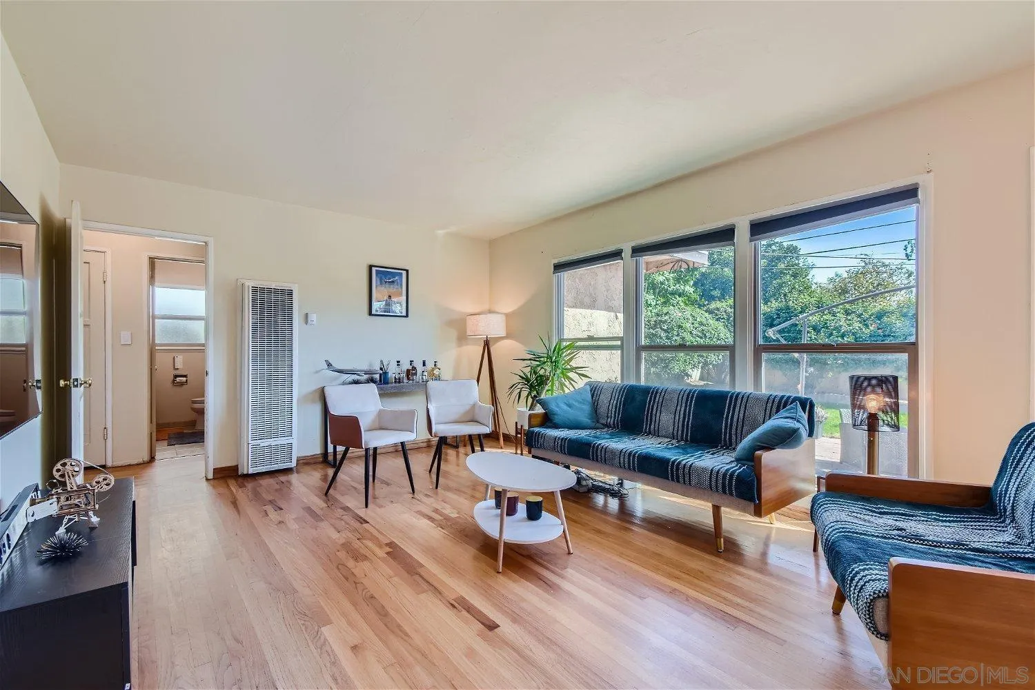 5259 Laurel Street San Diego, CA 92105 - Photo 7 of 32 a living room with furniture and a large window
