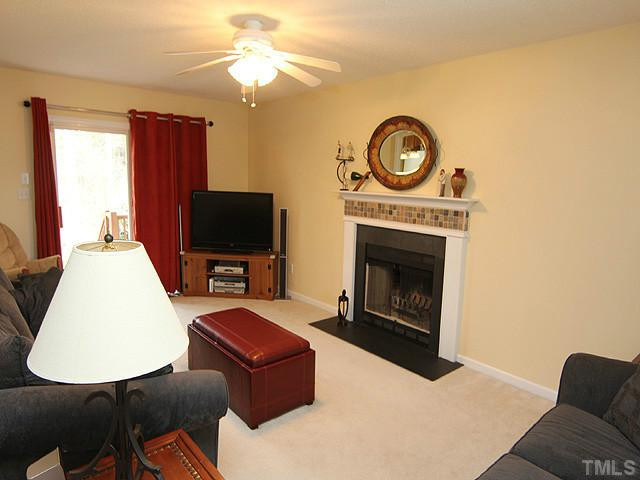 28 Round Spring Lane Durham, NC 27712 - Photo 3 of 12 ANOTHER VIEW OF LIVING ROOM SHOWS SLIDING GLASS DOOR LEADS TO COVERED PORCH. View