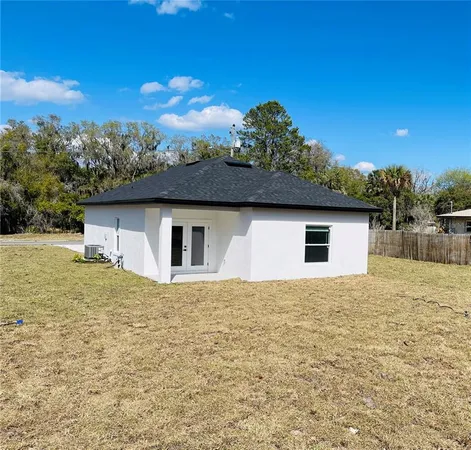 a house with yard in front of it