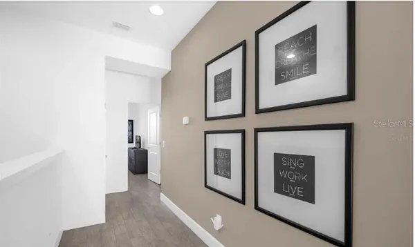 a view of a hallway with entryway