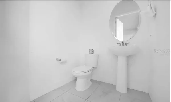 a bathroom with a toilet
