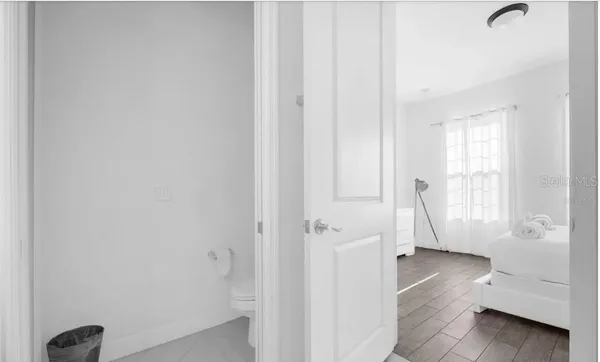 a view of a room with white walls