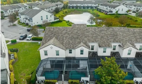 a aerial view of a house with a yard