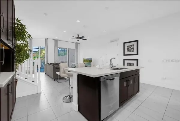 a view living room with furniture and a potted plant