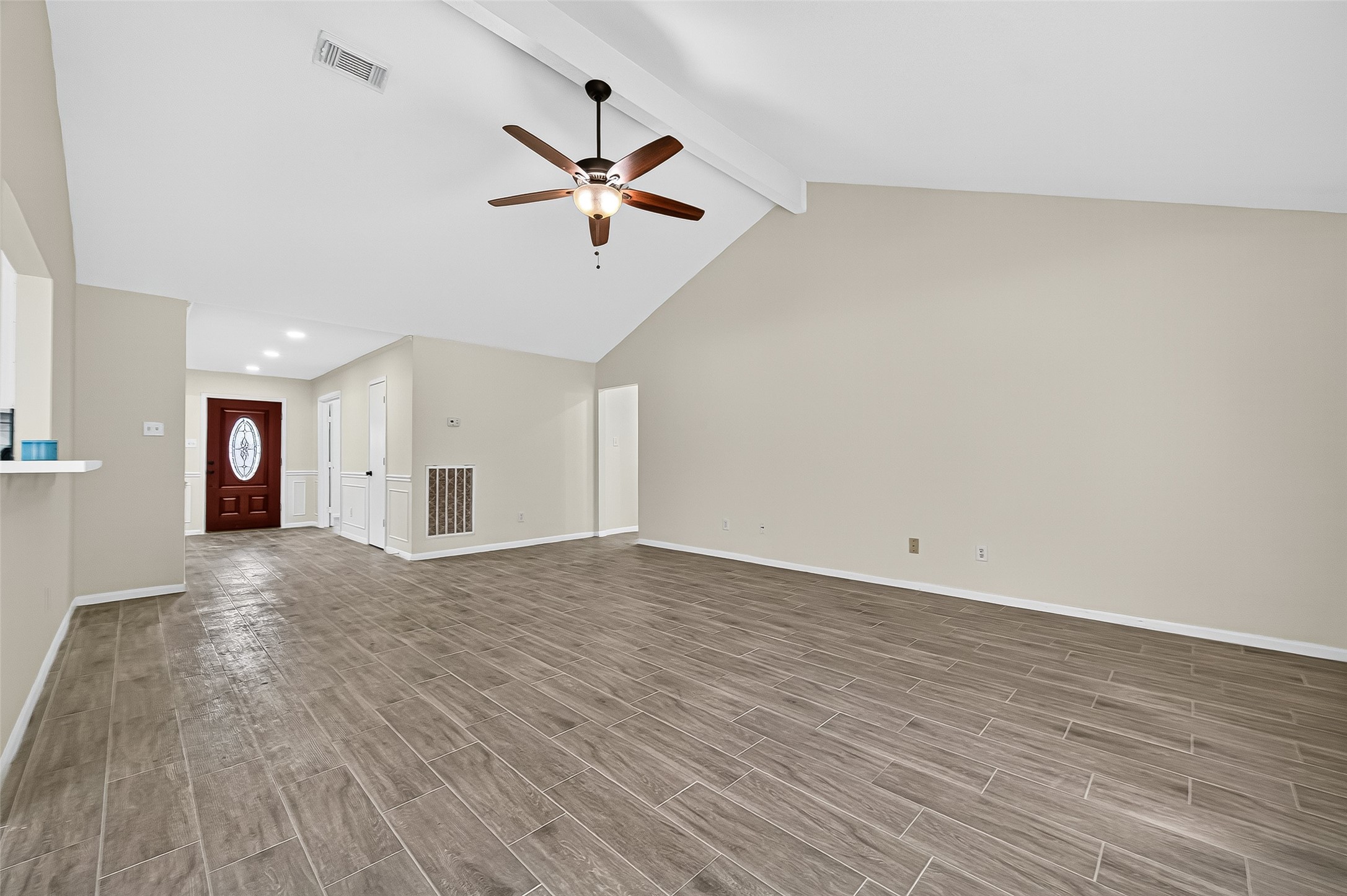 18759 Holly Way Houston, TX 77084 - Photo 17 of 46 a view of empty room with wooden floor