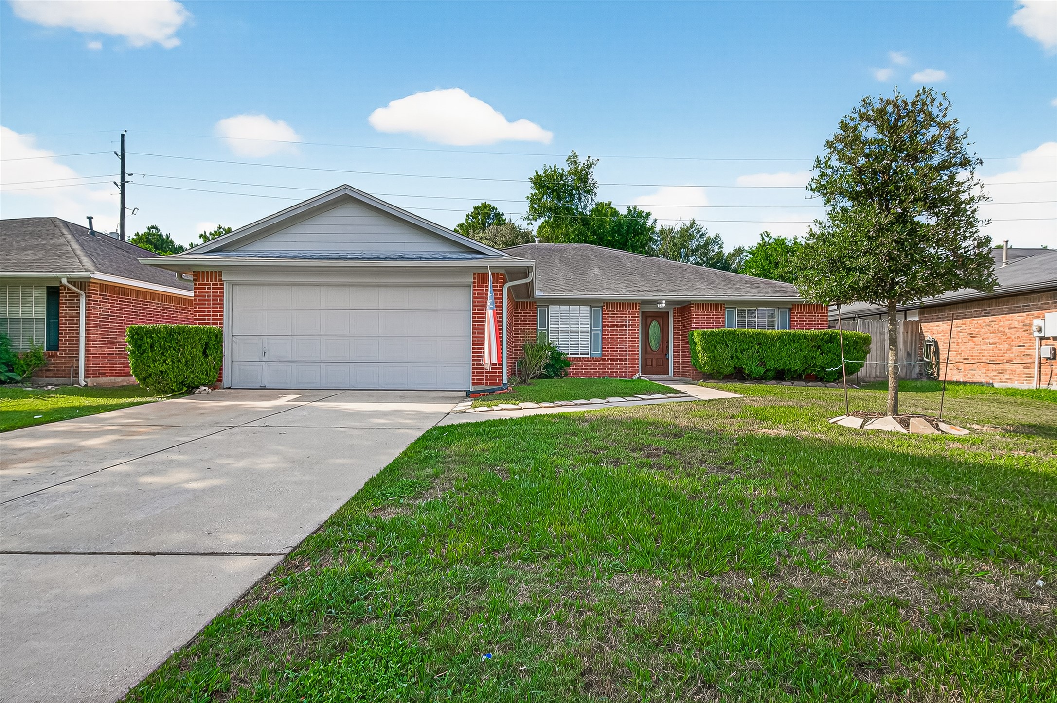 18759 Holly Way Houston, TX 77084 - Photo 2 of 46 a front view of house with yard and green space