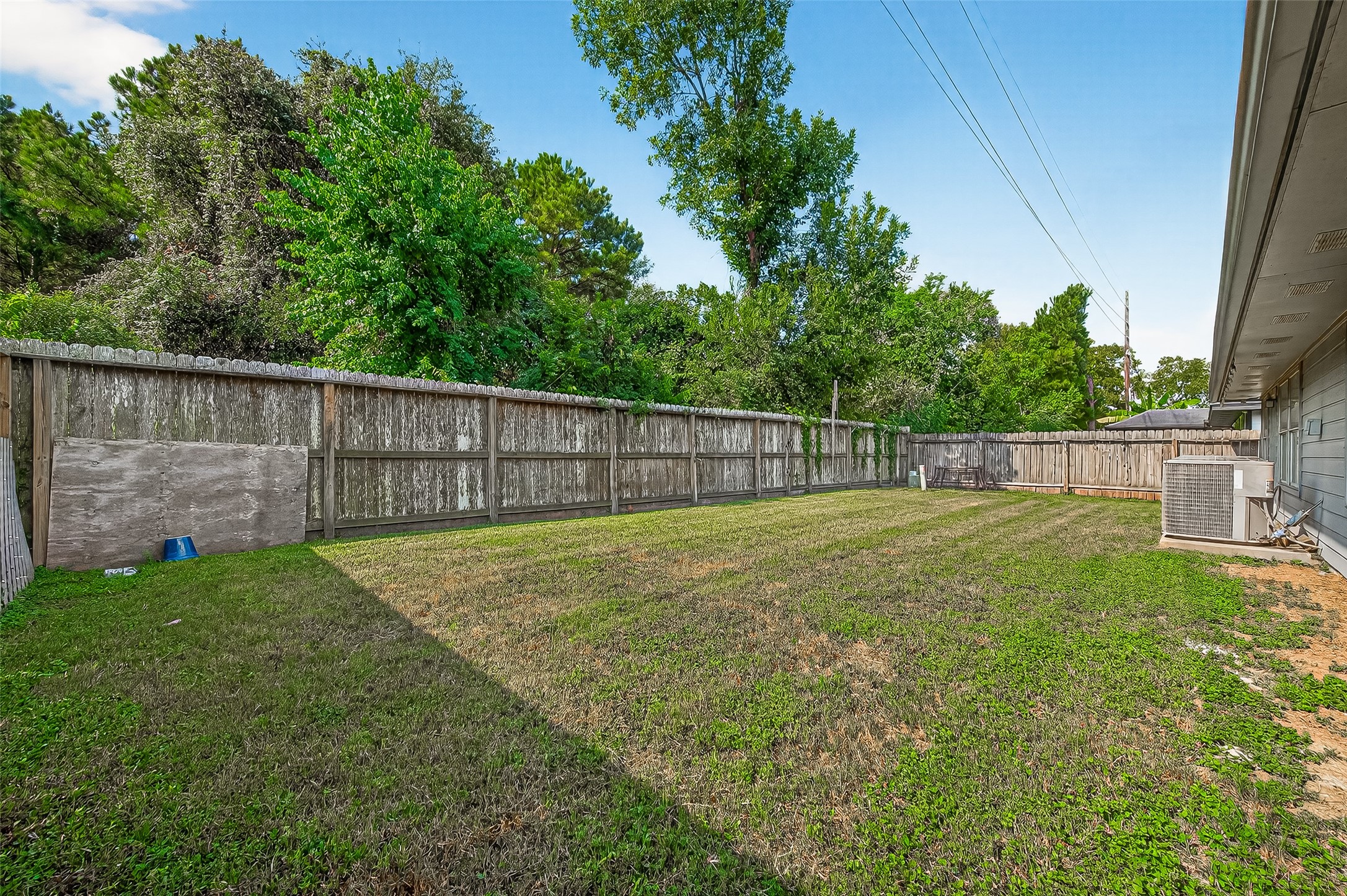 18759 Holly Way Houston, TX 77084 - Photo 45 of 46 a view of backyard with wooden fence
