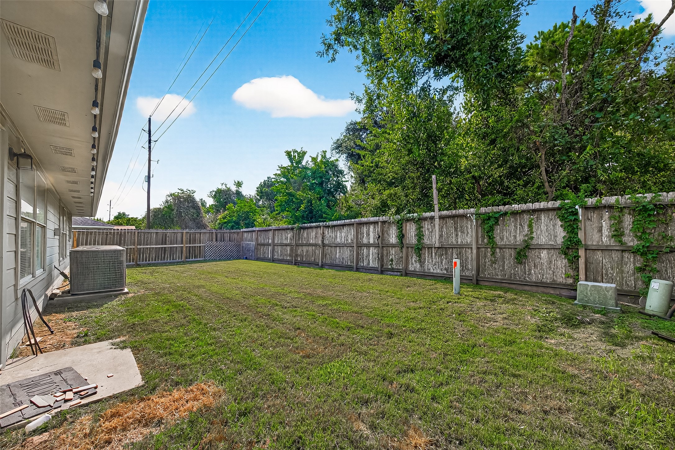 18759 Holly Way Houston, TX 77084 - Photo 46 of 46 a view of a backyard with a slide