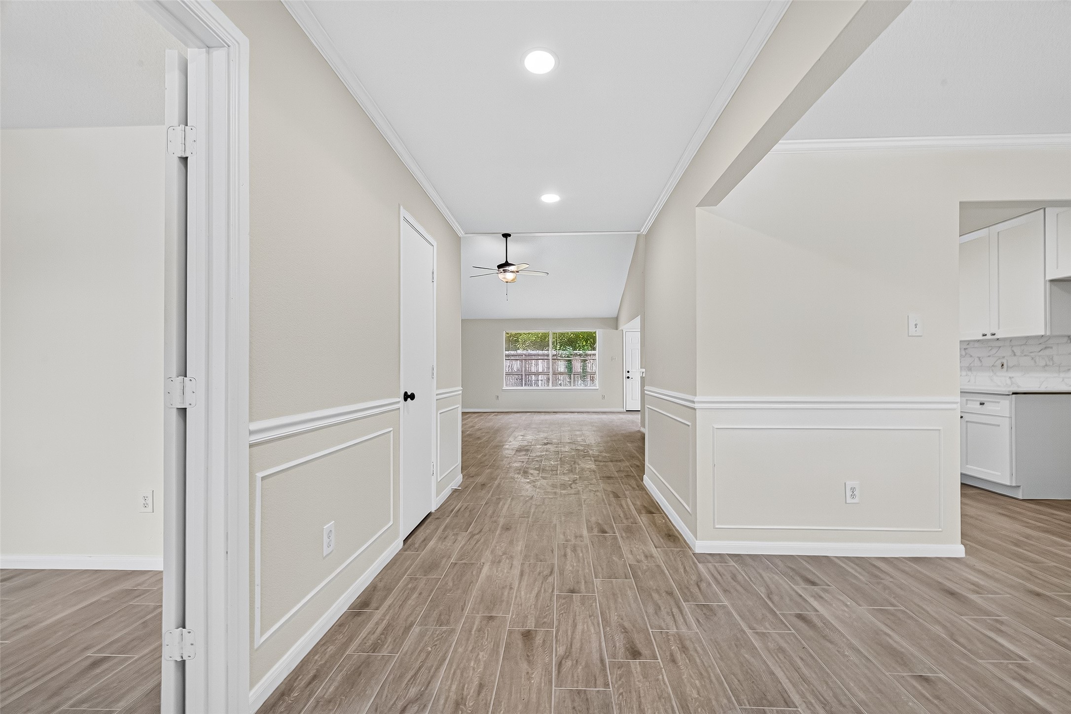 18759 Holly Way Houston, TX 77084 - Photo 6 of 46 a view of hallway with wooden floor