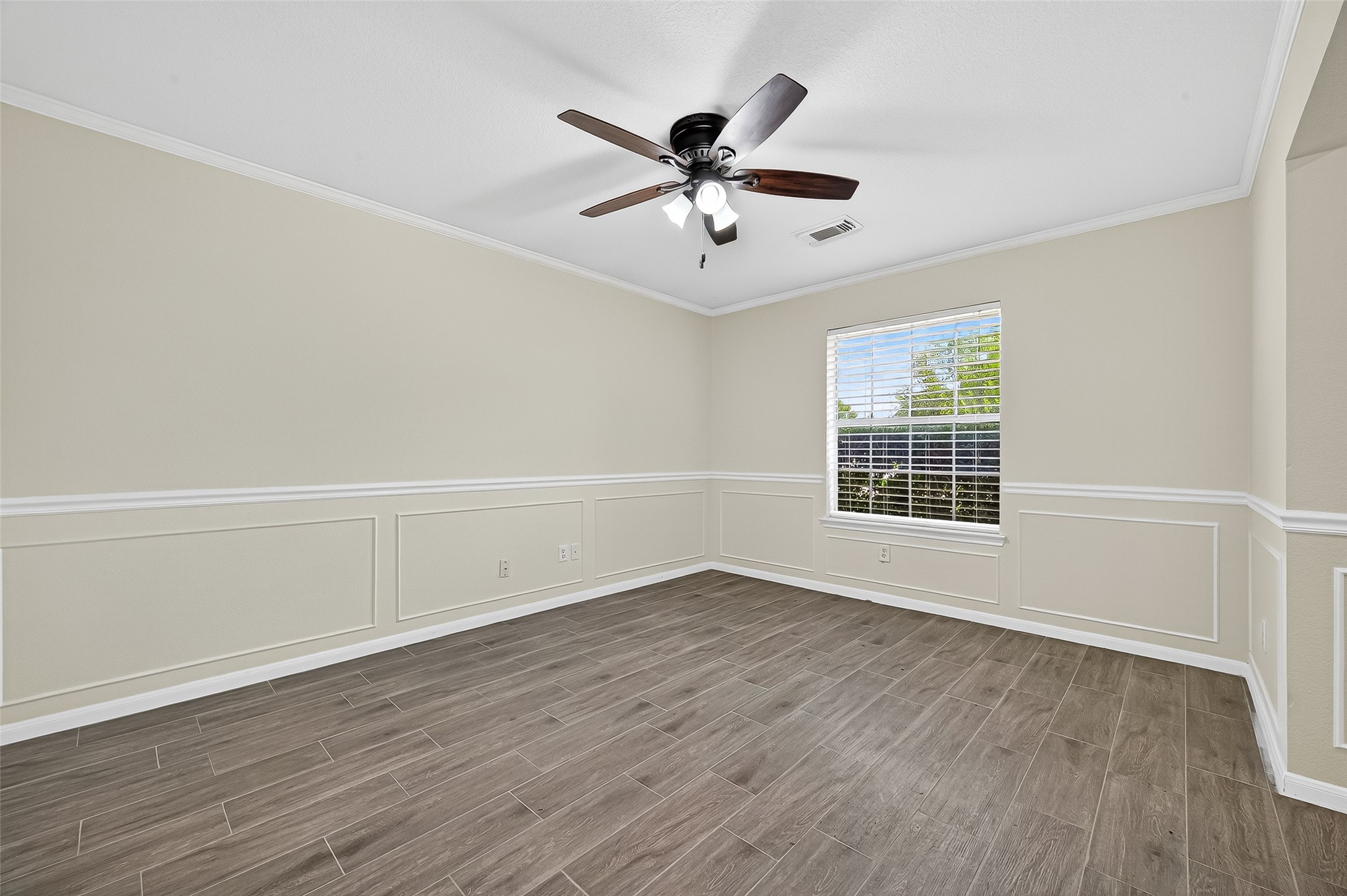 18759 Holly Way Houston, TX 77084 - Photo 7 of 46 wooden floor in an empty room with a window