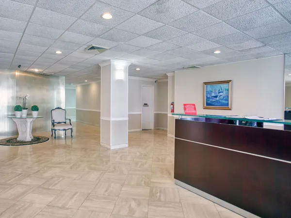 a view of a livingroom with furniture
