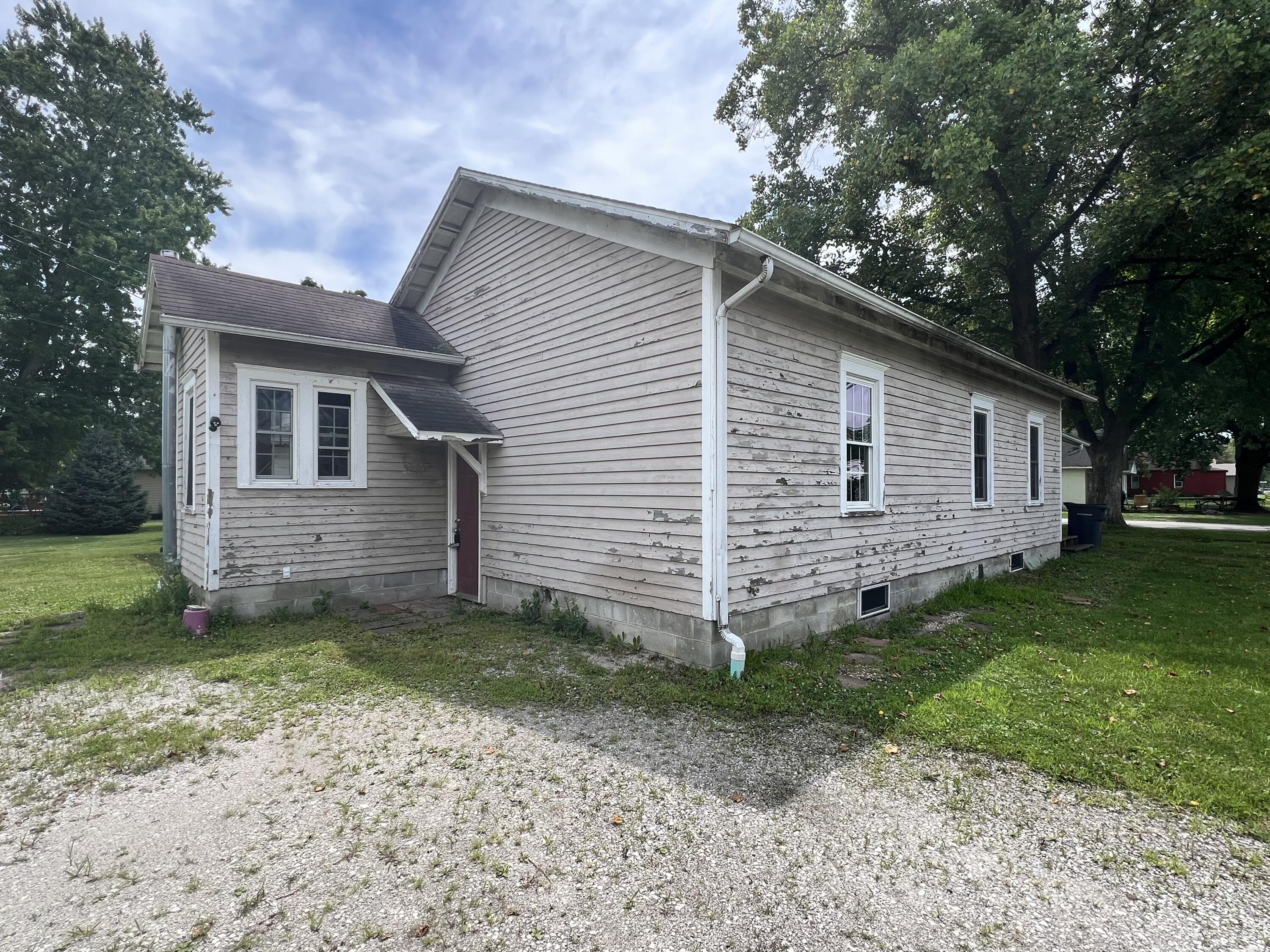 702 East Elm Street Rensselaer, IN 47978 - Photo 3 of 22 a view of a house with a yard