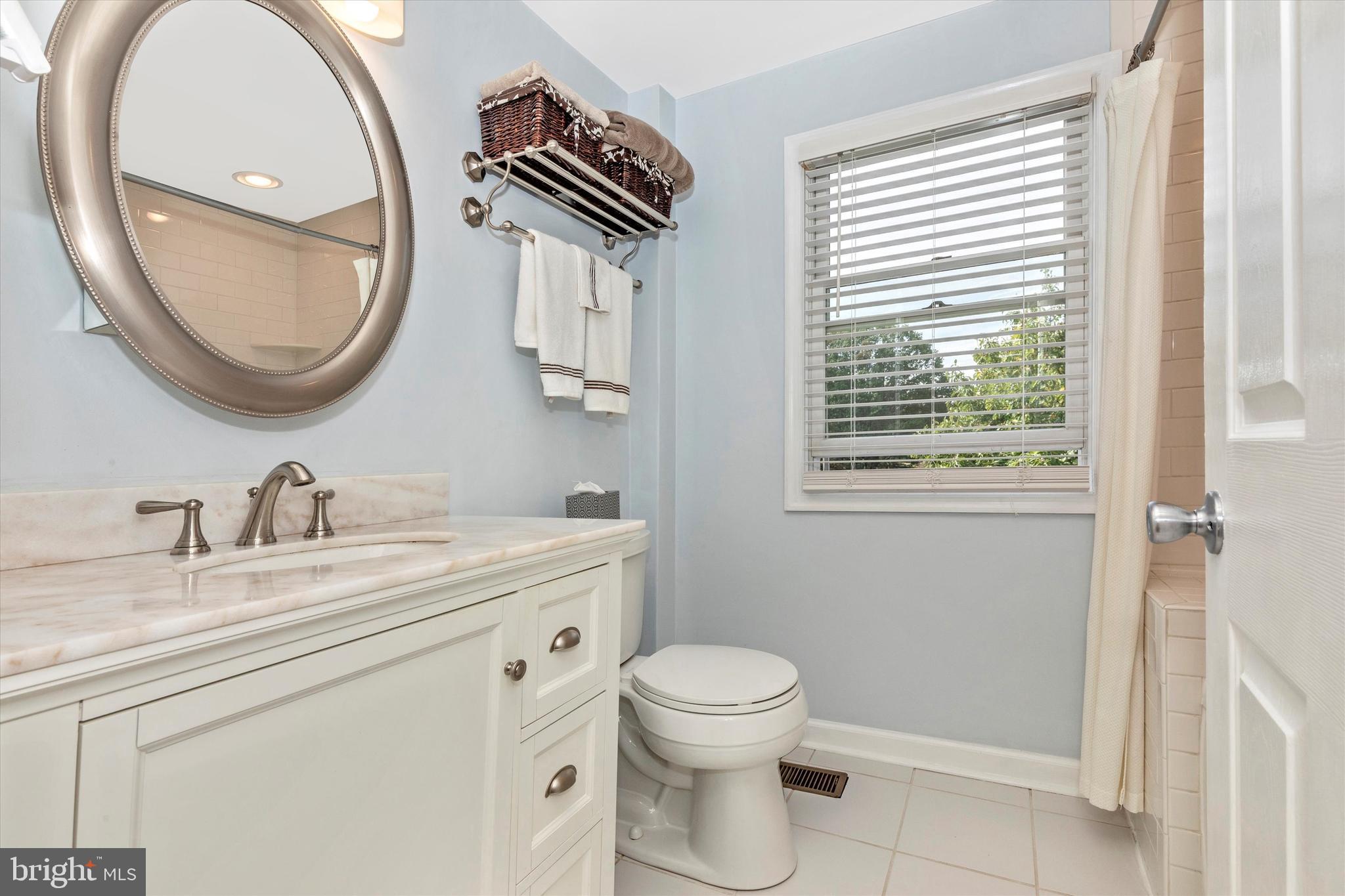 94 East Conestoga Road Devon, PA 19333 - Photo 19 of 34 Bath with raised vanity & deep jetted tub / shower