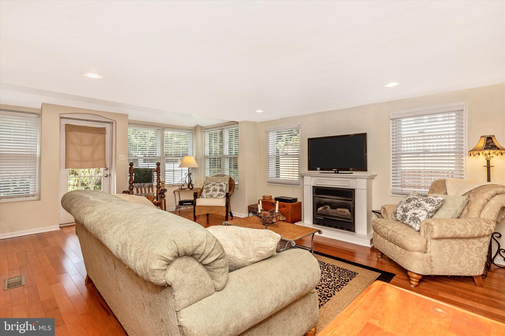 94 East Conestoga Road Devon, PA 19333 - Photo 3 of 34 Enlarged living room with gas fireplace