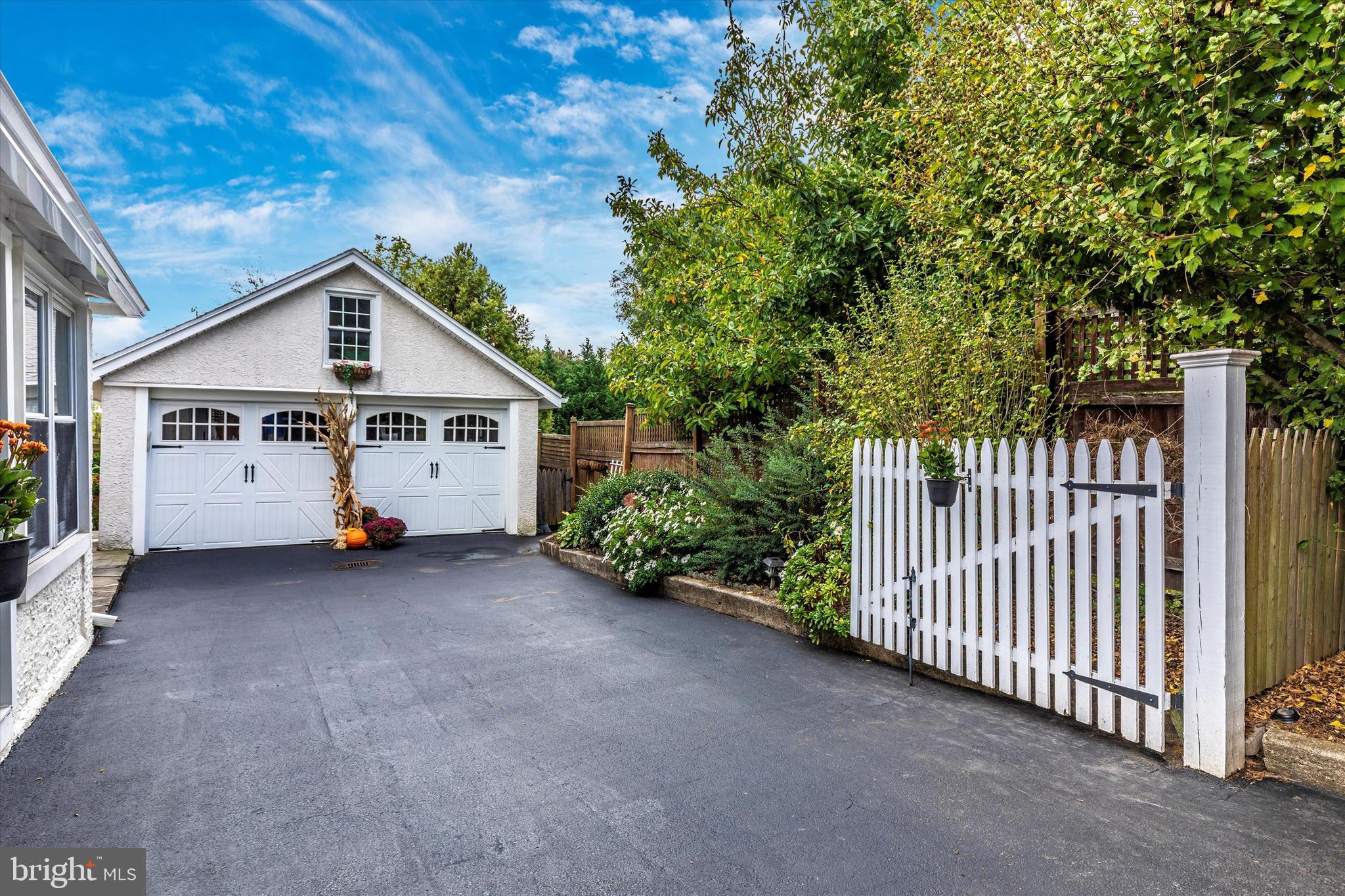 94 East Conestoga Road Devon, PA 19333 - Photo 28 of 34 Gated driveway & two car garage with loft storage